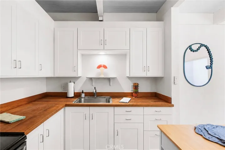 Cabinet doors digitally added. They'll be installed before close of escrow.