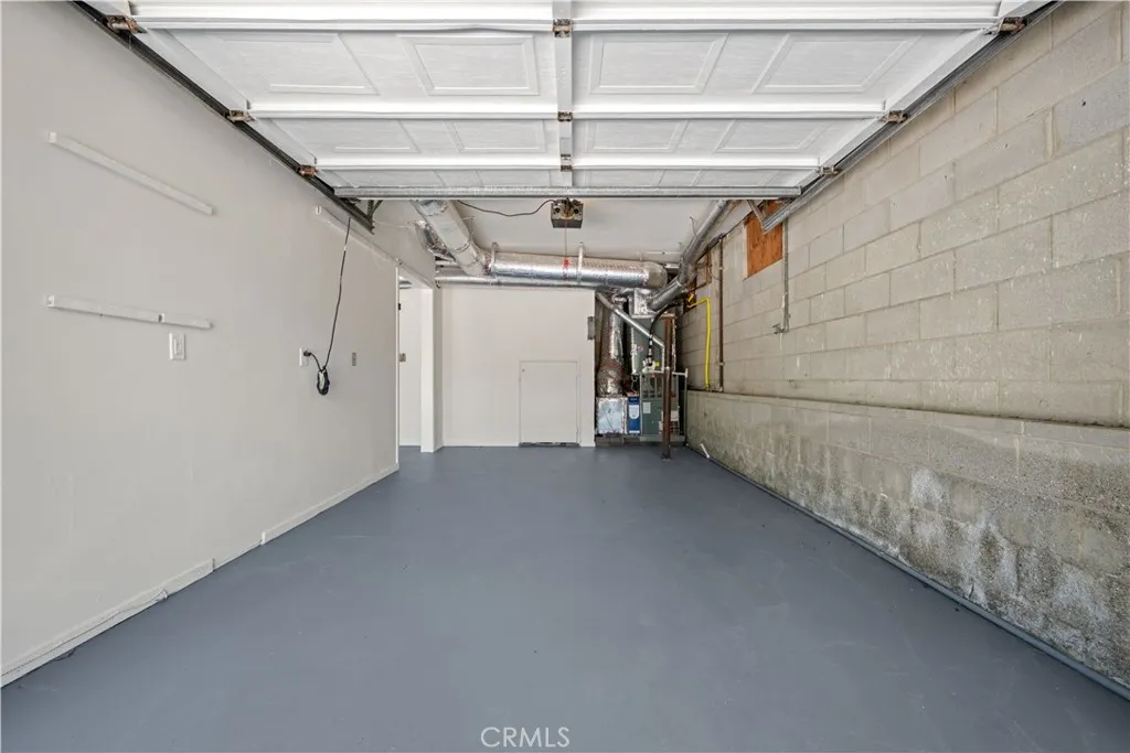 Right side garage has storage closet.
