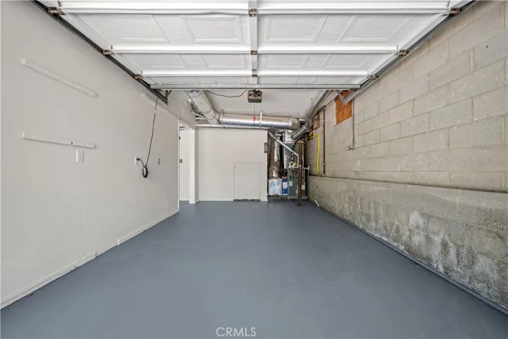 Right side garage has storage closet.