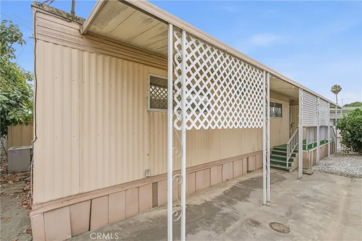 Steps from Front Porch to Uncovered Patio Area