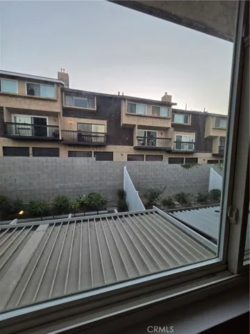 View from the window of 2nd bedroom showing a different Townhome Complex at the back