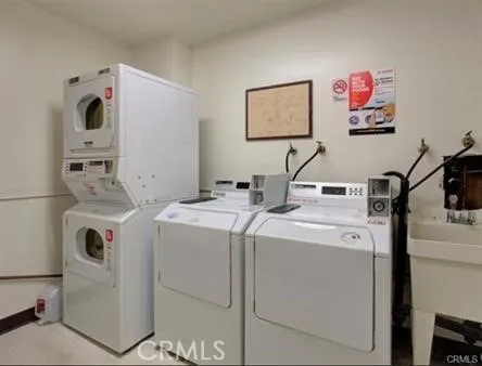 Down the hall each floor has laundry room with wash app