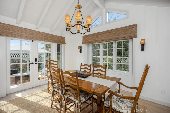Charming dining room space with attention to detail with lighting.