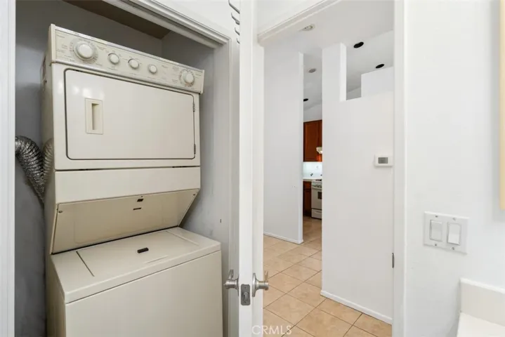 Laundry closet adds to the convenience of daily living.