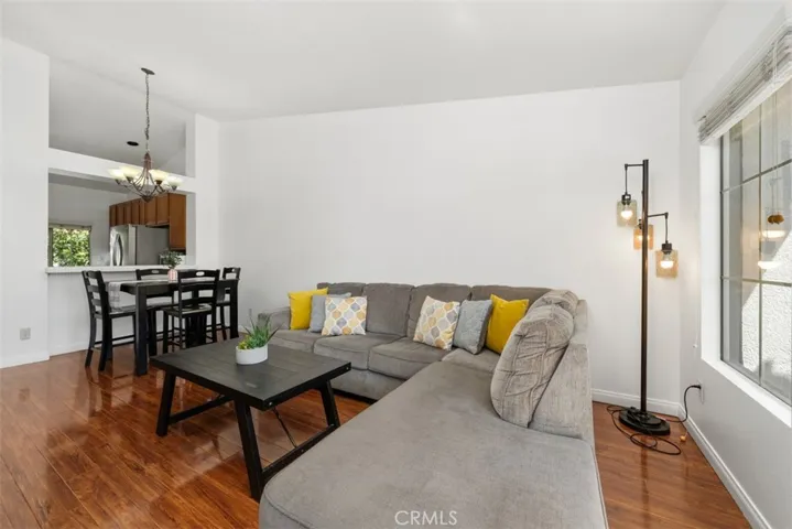 Livingroom, dining area and breakfast counter.