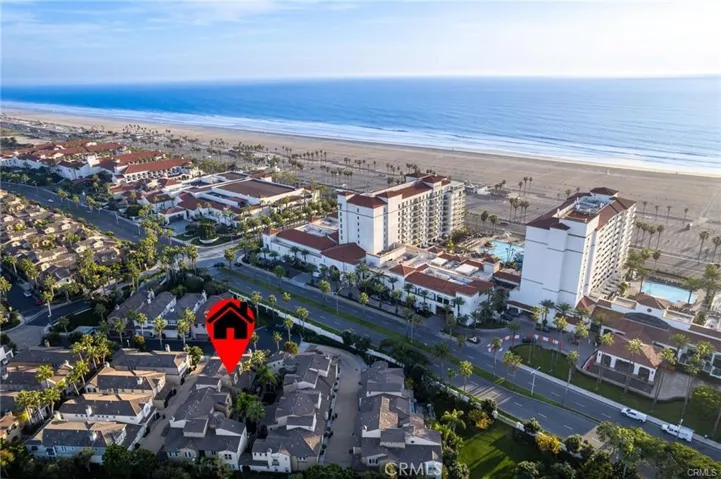Experience the ultimate year-round vacation lifestyle in this exceptional coastal residence just steps to the beach!