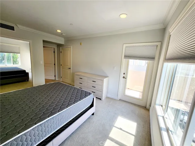 secondary bedroom with balcony