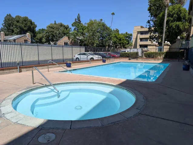Pool & Spa Area with Bathrooms