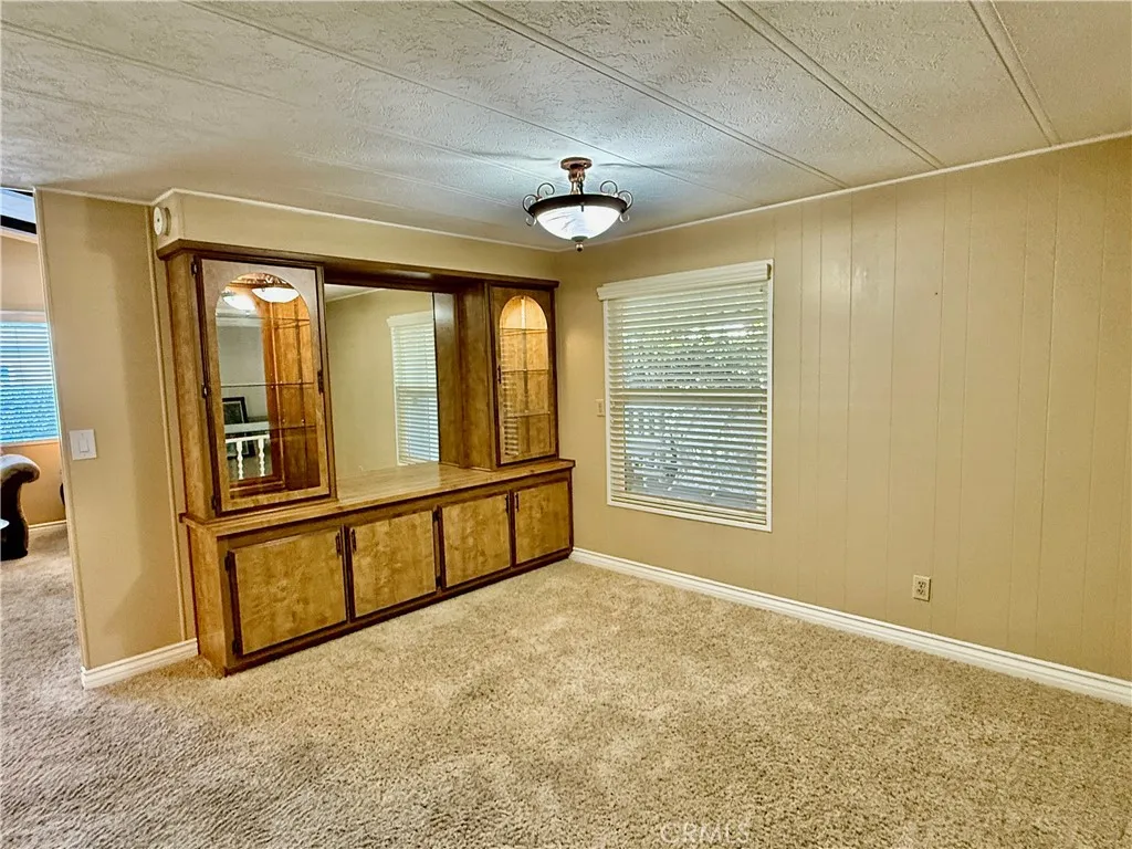 Built-in cabinet and display case at dining room