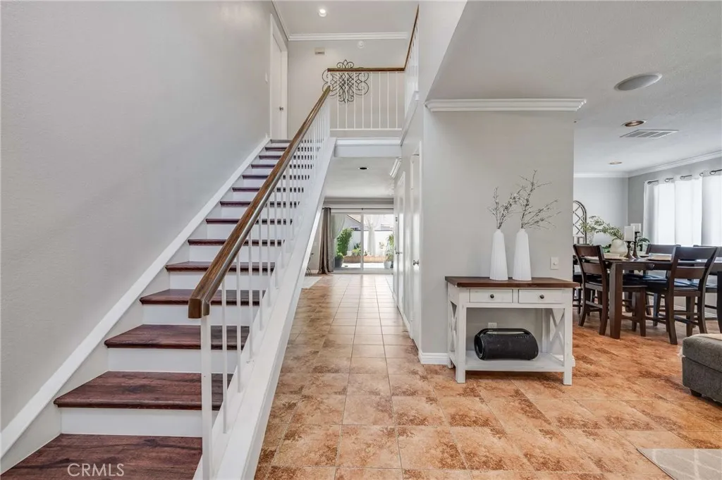 High Ceilings and Beautiful Staircase Leads to Bedrooms and Bathrooms