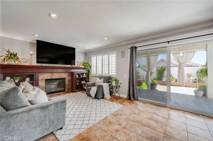 Roomy Family Room with Sliding Glass Door out to the Backyard