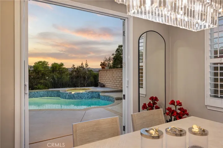 Indoor-outdoor living with views of the pool