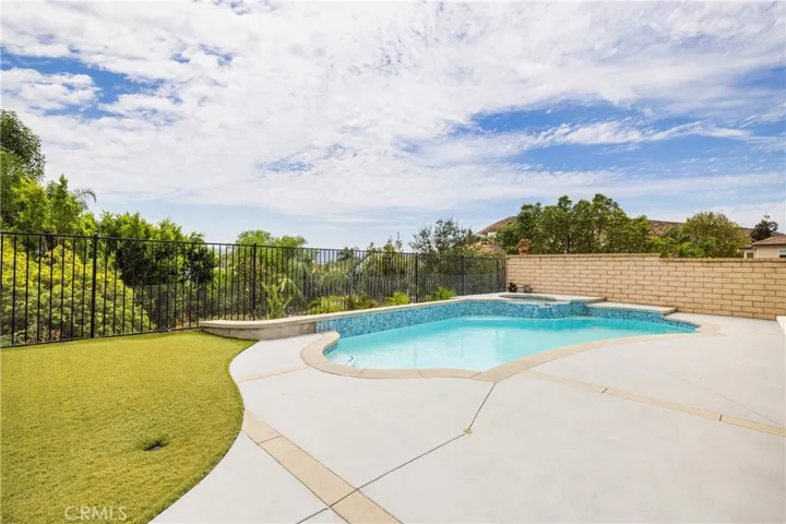 Pool with hillside backdrop