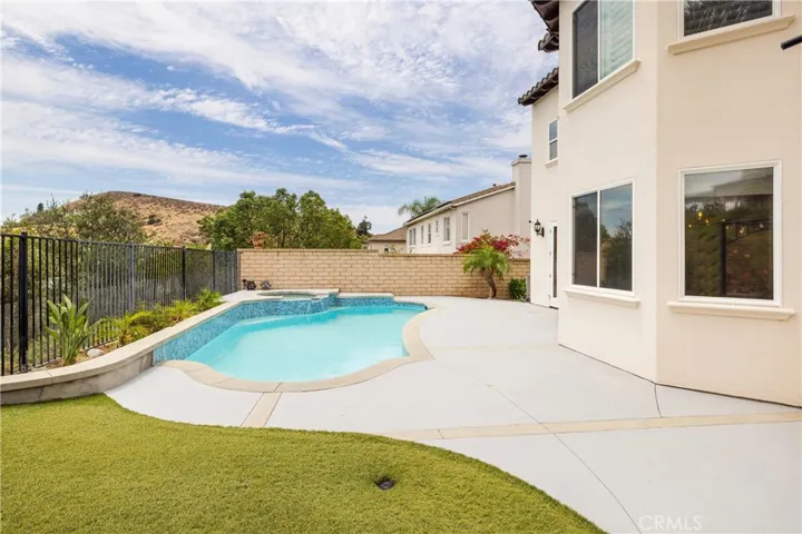 Pool and backyard from the patio