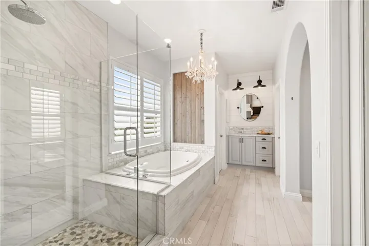 Spa-inspired primary bathroom with soaking tub