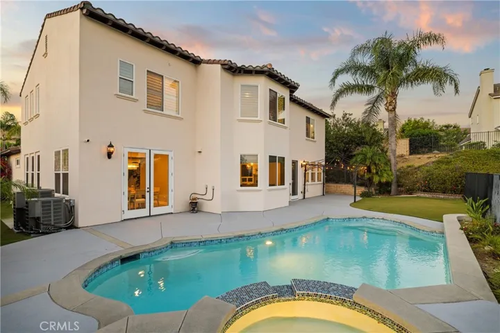 Private backyard with pool and spa