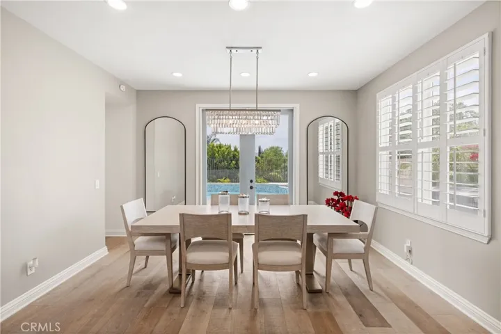 Formal dining room filled with natural light