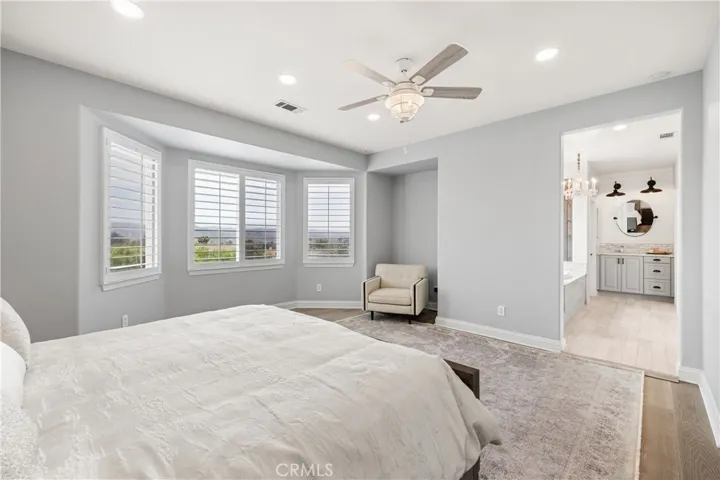 Expansive primary suite with sitting area