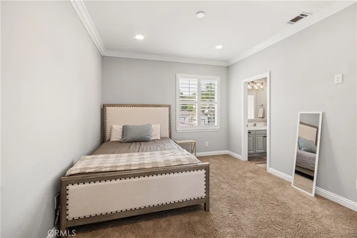 Spacious secondary bedroom with attached full bathroom