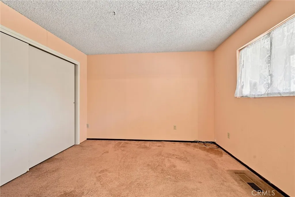 Bedroom 2, off front entry would make great home office space.