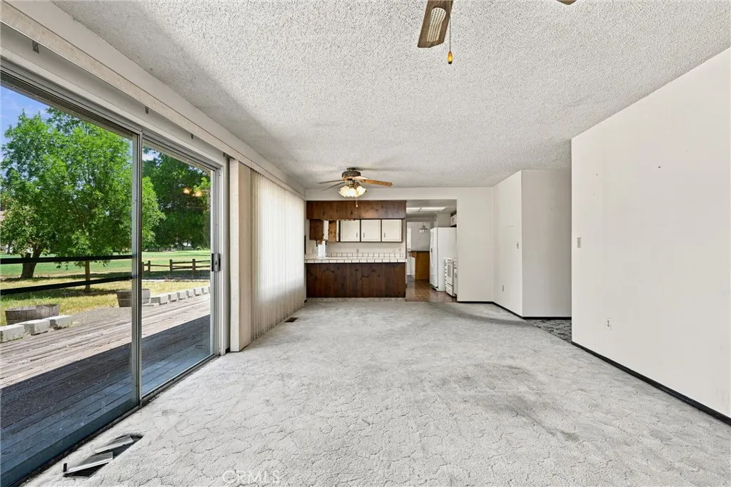 Kitchen, looking from fireplace area.