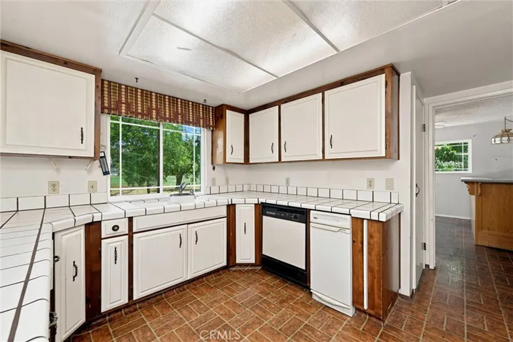 Lots of cabinetry in the kitchen.