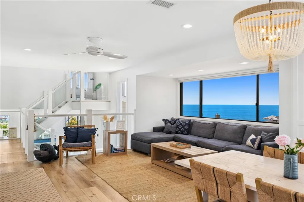 The light filled open floor plan is designed for effortless living and entertaining, with the kitchen flowing seamlessly into the main living area.