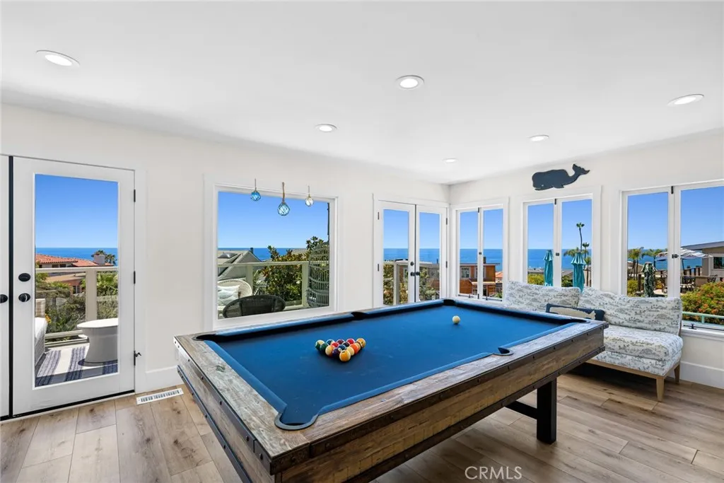 An additional family room offers flexibility as a media room or lounge.