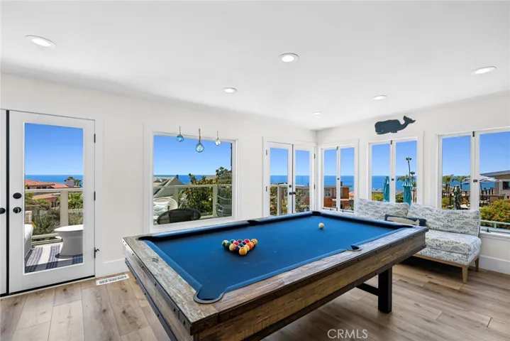 An additional family room offers flexibility as a media room or lounge.