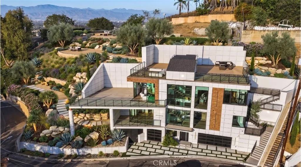 Outdoor furniture and landscaping have been virtually staged.