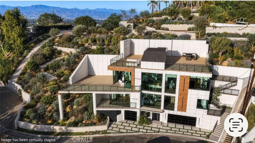 Outdoor furniture and landscaping have been virtually staged.