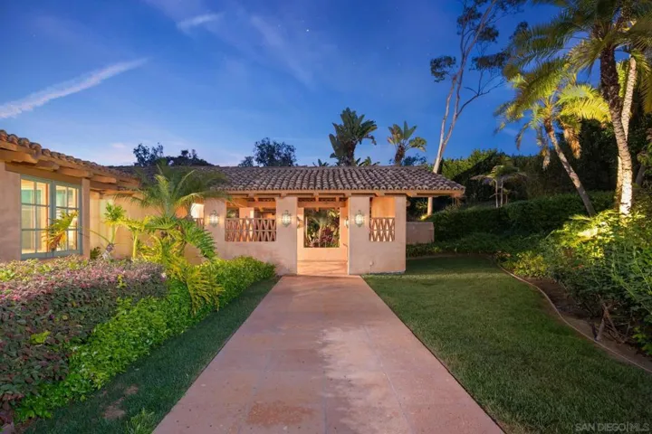 Stunning, private gated entrance and graceful walk up to front door.