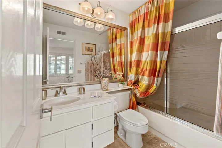 Attached Bathroom with Tub and Shower.