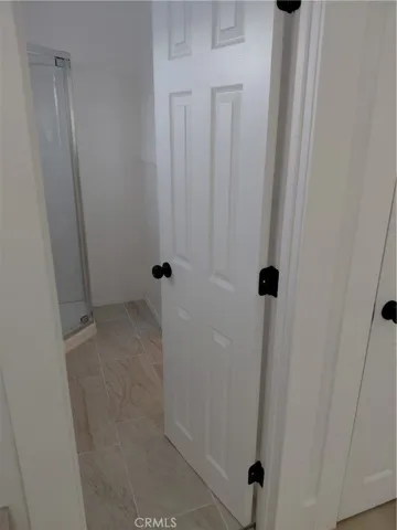 BATHROOM WITH TILE FLOORS