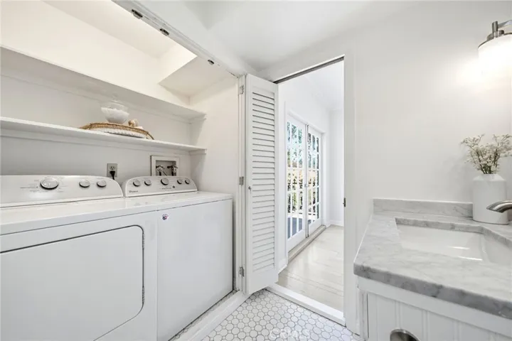 Primary Ensuite Laundry Closet 
