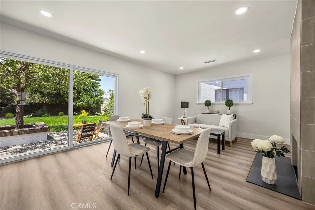 Dining area opens directly to the patio and backyard via sliding glass door