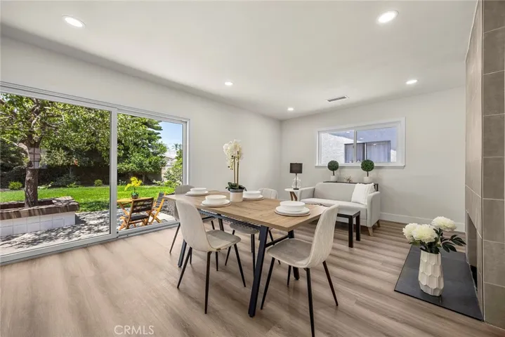 Dining area opens directly to the patio and backyard via sliding glass door