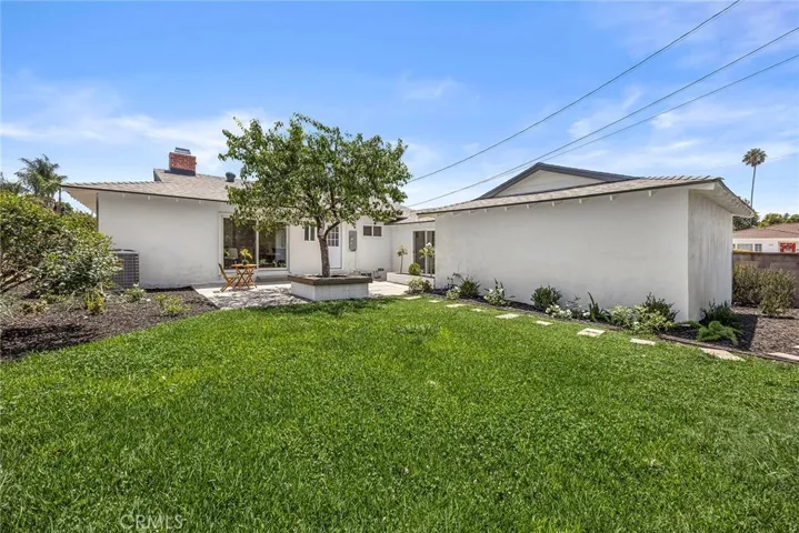 Spacious, private backyard offering endless possibilities for outdoor living and entertaining
