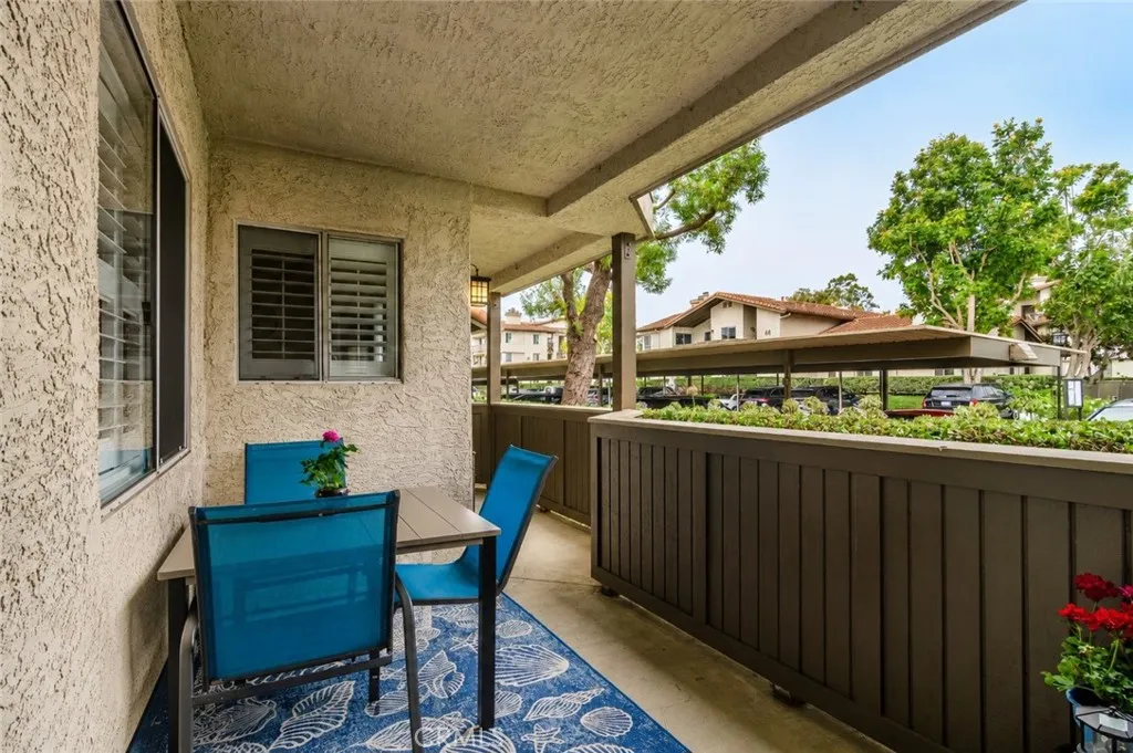 Digitally Altered Image – One patio chair has been digitally removed. Original photo follows.