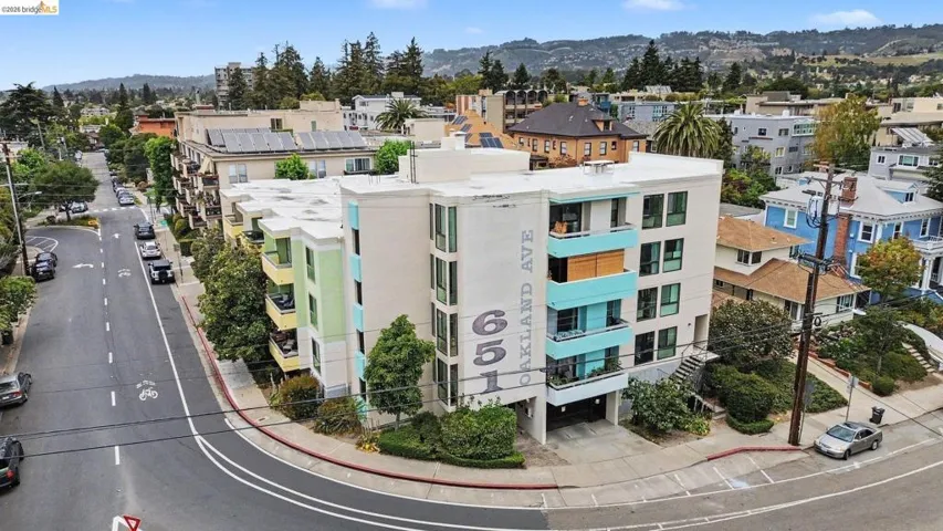 Modern multi-story building featuring a prominent street address