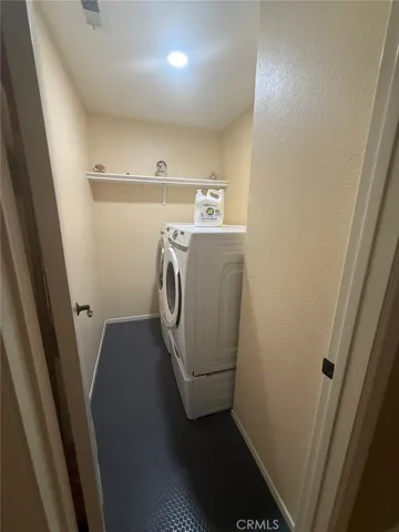 Separate laundry room.