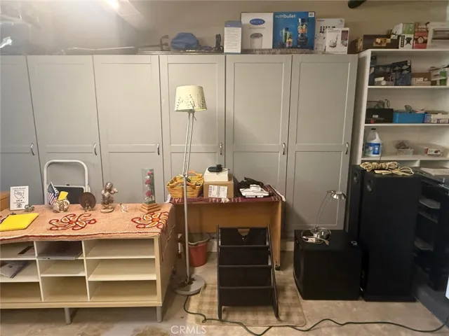 Upgraded closets against two walls in garage.