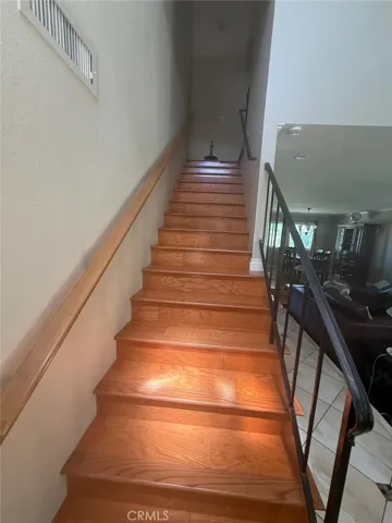 Wood floors leading to second floor.