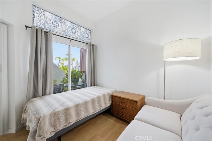 Sliding doors leading to the front balcony.