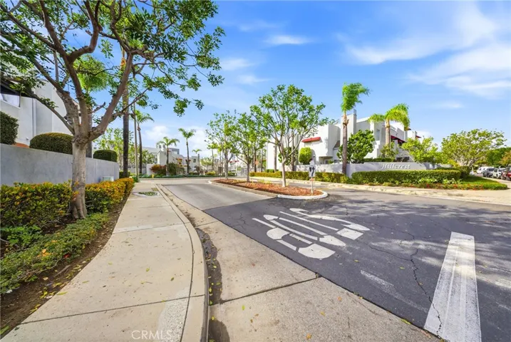Well-maintained community grounds with mature landscaping throughout.
