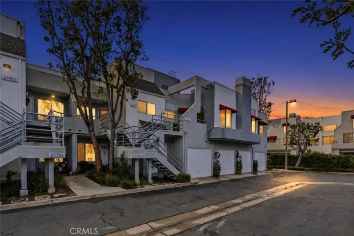 Twilight Photo:Private entryway creating a welcoming first impression.