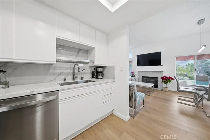 Beautifully upgraded kitchen with quartz countertops.