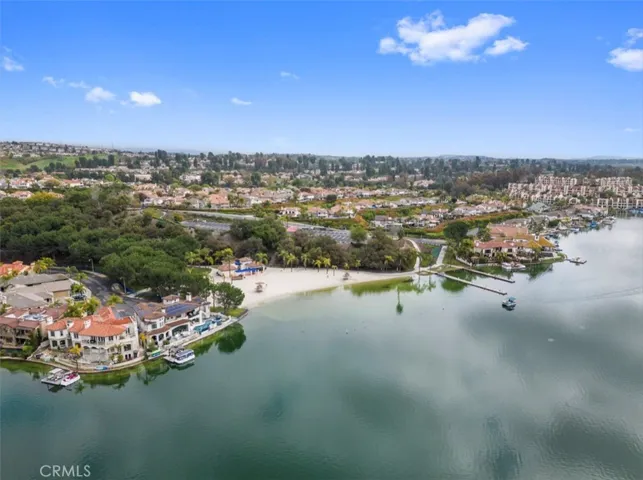 Expansive lake and neighborhood views highlight the charm of this South Orange County location.