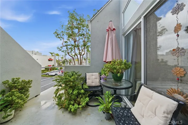 Front balcony just off the entry, perfect for morning coffee.