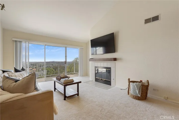 A spacious living room with fireplace